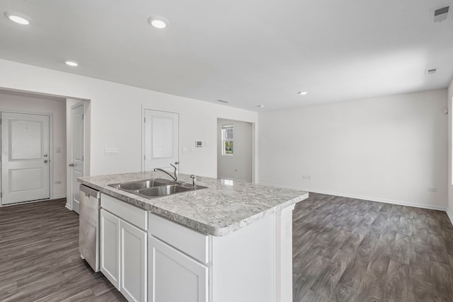 319 Brickyard Ct, Joliet, IL 60436 - kitchen with stainless steel dishwasher, a center island with sink, dark wood-type flooring, light countertops, and white cabinetry