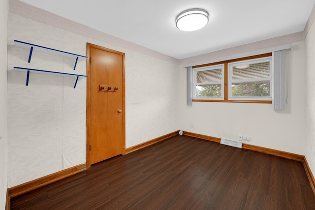 8201 Paloma Dr, Orland Park, IL 60462 - unfurnished room with dark wood-style floors and baseboards