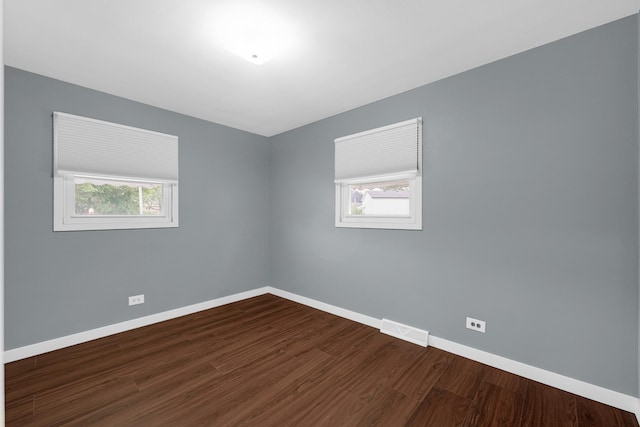 8201 Paloma Dr, Orland Park, IL 60462 - unfurnished room featuring baseboards and dark wood-style floors