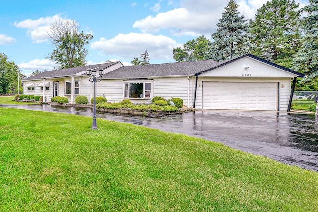 8201 Paloma Dr, Orland Park, IL 60462 - ranch-style home with driveway, a front lawn, and an attached garage