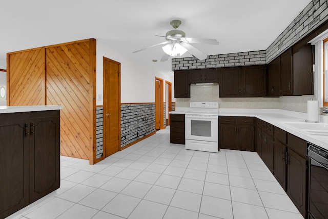 8201 Paloma Dr, Orland Park, IL 60462 - kitchen with white electric range, dishwashing machine, dark brown cabinets, and wainscoting