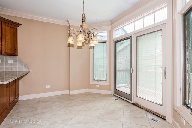 1803 Rizzi Ln, Bartlett, IL 60103 - unfurnished dining area featuring a chandelier and crown molding