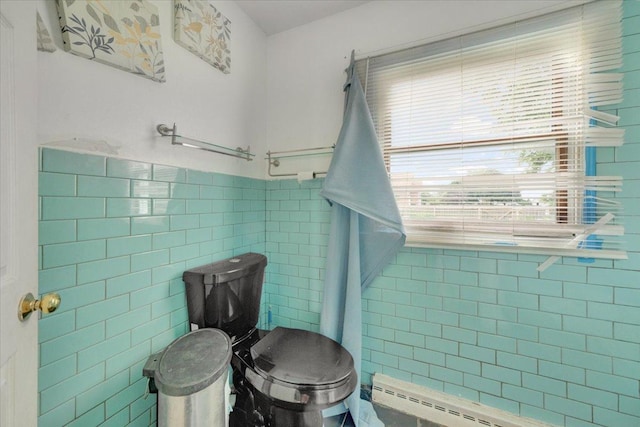302 S Leney St, Ogden, IL 61859 - bathroom with tile walls and a baseboard radiator