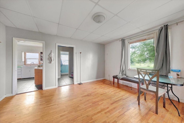 302 S Leney St, Ogden, IL 61859 - sitting room featuring a drop ceiling, healthy amount of natural light, and light wood finished floors