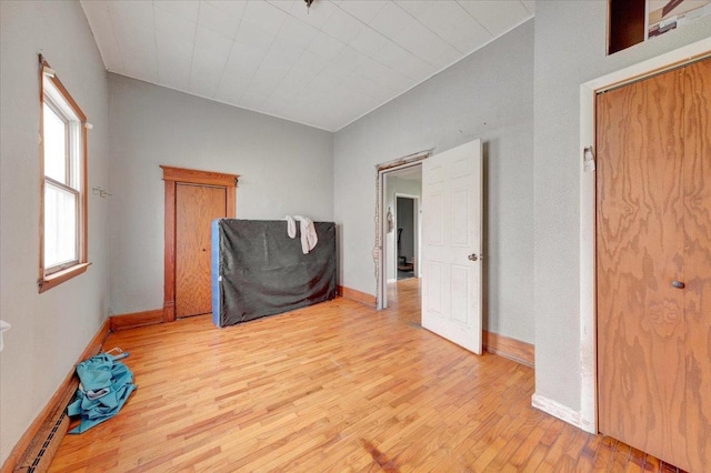 302 S Leney St, Ogden, IL 61859 - bedroom featuring light wood-type flooring and baseboards