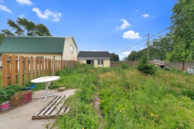 302 S Leney St, Ogden, IL 61859 - fenced backyard featuring a shed