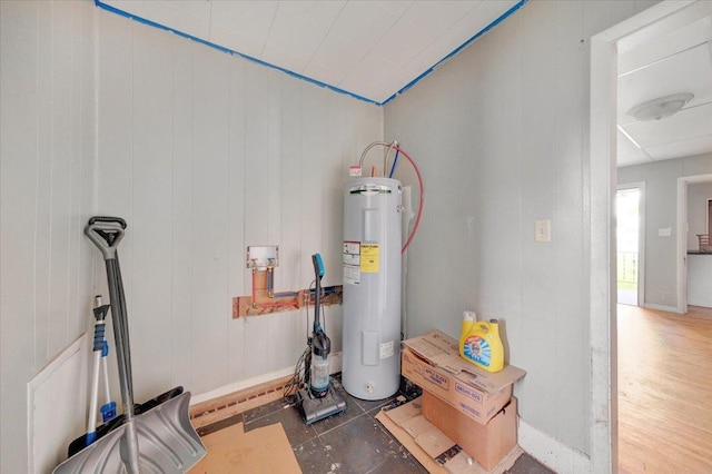 302 S Leney St, Ogden, IL 61859 - utility room featuring electric water heater