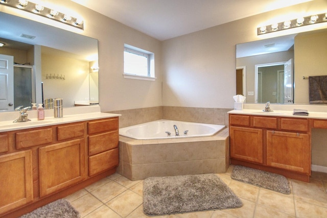 8307 Newbridge Ct, Joliet, IL 60431 - full bath with tile patterned flooring, two vanities, a garden tub, and a stall shower
