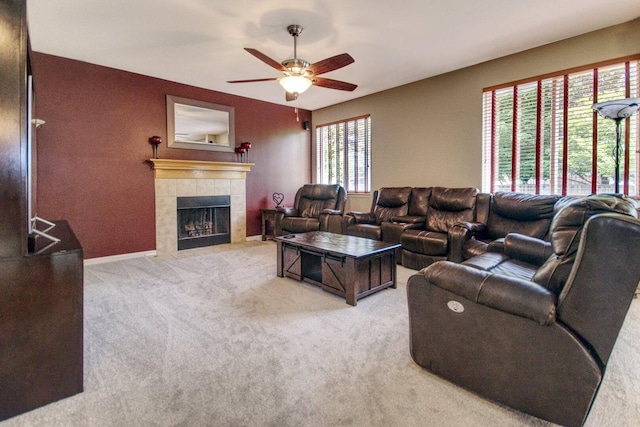 8307 Newbridge Ct, Joliet, IL 60431 - living room featuring light carpet, ceiling fan, and a tiled fireplace