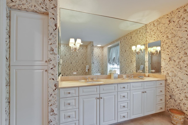 531 N Mayflower Rd Unit 531, Lake Forest, IL 60045 - full bathroom with a chandelier, double vanity, and wallpapered walls