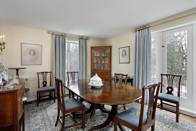 531 N Mayflower Rd Unit 531, Lake Forest, IL 60045 - dining area featuring light wood finished floors and wainscoting
