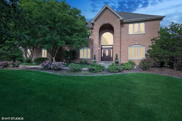 25397 N Northbridge Rd, Hawthorn Woods, IL 60047 - view of front of home featuring brick siding, a front lawn, and roof with shingles