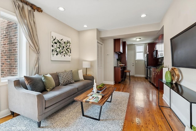 4332 N Sacramento Ave Unit 3S, Chicago, IL 60618 - living area with light wood-type flooring and recessed lighting