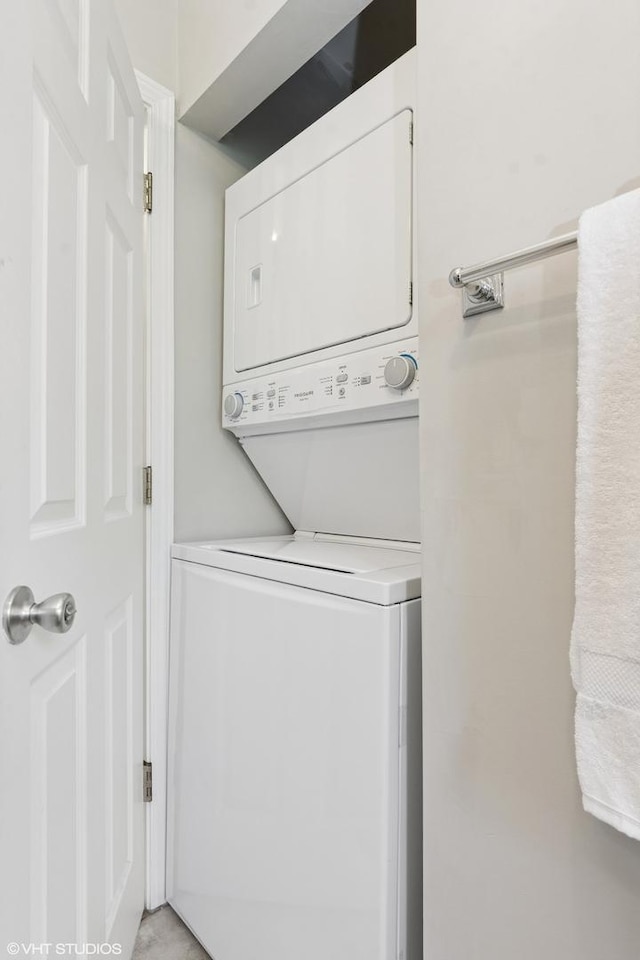 4332 N Sacramento Ave Unit 3S, Chicago, IL 60618 - laundry room with stacked washing machine and dryer