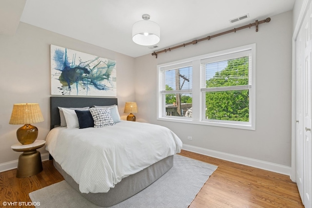 4332 N Sacramento Ave Unit 3S, Chicago, IL 60618 - bedroom with baseboards and light wood-style floors