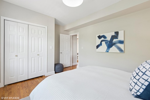 4332 N Sacramento Ave Unit 3S, Chicago, IL 60618 - bedroom featuring a closet and wood finished floors