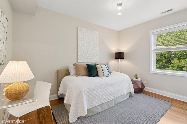 4332 N Sacramento Ave Unit 3S, Chicago, IL 60618 - bedroom with baseboards and wood finished floors