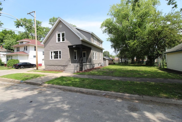 957 E Eagle St, Kankakee, IL 60901 - view of front of house with a front lawn