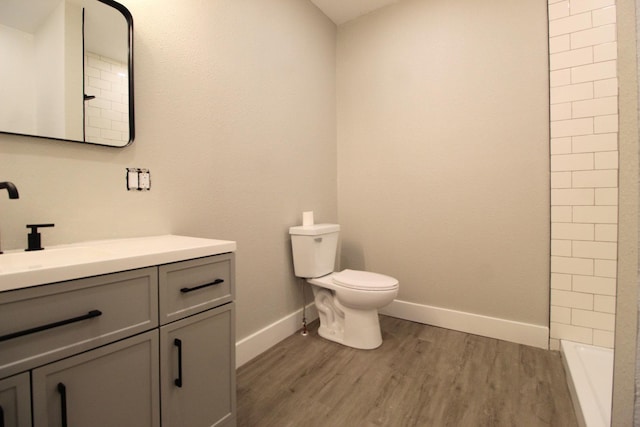 957 E Eagle St, Kankakee, IL 60901 - bathroom with vanity, wood finished floors, and a shower