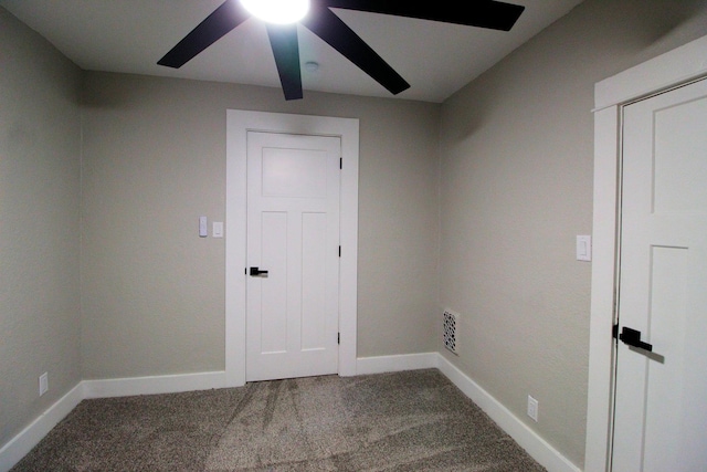 957 E Eagle St, Kankakee, IL 60901 - unfurnished room with a ceiling fan and carpet flooring