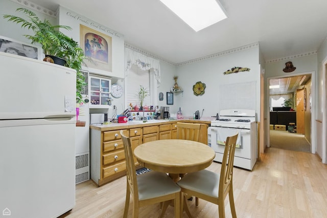 1448 W Taylor St, Chicago, IL 60607 - kitchen with white appliances, light wood finished floors, and light countertops
