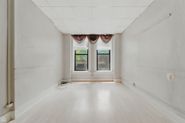 1448 W Taylor St, Chicago, IL 60607 - spare room featuring a paneled ceiling and wood finished floors
