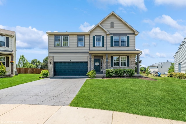 253 Brookhaven Trl, Pingree Grove, IL 60140 - view of front of house featuring a garage, asphalt driveway, and covered porch