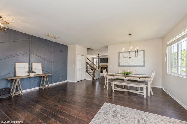 253 Brookhaven Trl, Pingree Grove, IL 60140 - dining room featuring a chandelier, wood finished floors, and stairs