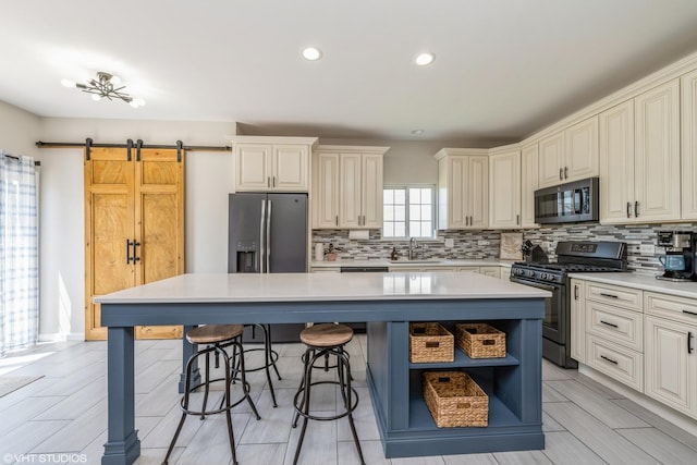 253 Brookhaven Trl, Pingree Grove, IL 60140 - kitchen featuring stainless steel appliances, open shelves, a kitchen island, decorative backsplash, and light countertops