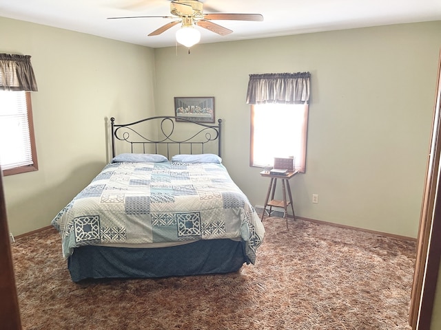 1660 Laharpe St, Lasalle, IL 61301 - carpeted bedroom featuring multiple windows and ceiling fan