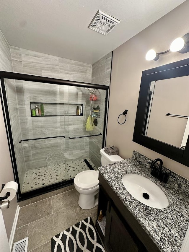 1015 Hastings Ln, Hanover Park, IL 60133 - full bathroom featuring vanity and a shower stall