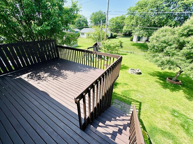 1015 Hastings Ln, Hanover Park, IL 60133 - deck featuring a lawn