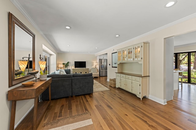 440 Menominee Ln, Naperville, IL 60563 - living area with wood finished floors, crown molding, and recessed lighting