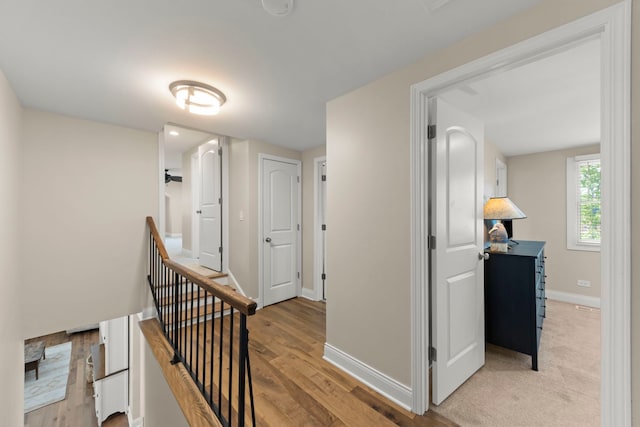 440 Menominee Ln, Naperville, IL 60563 - corridor with an upstairs landing and light wood-style floors