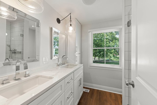 440 Menominee Ln, Naperville, IL 60563 - bathroom with double vanity, wood finished floors, and a shower