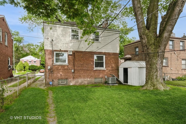 back of property with a storage unit, a chimney, and brick siding