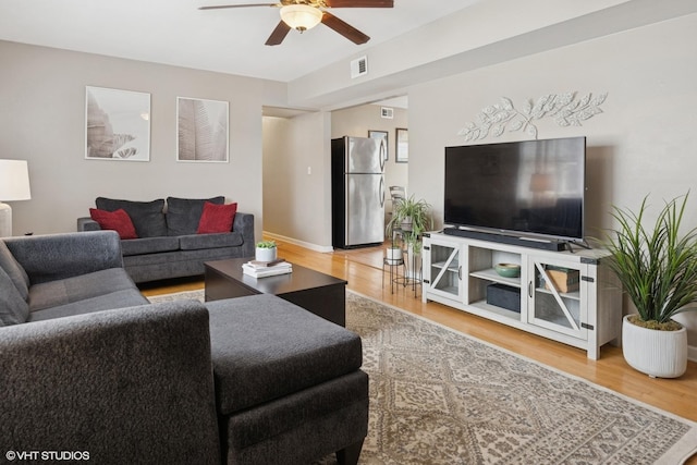 2652 W Rascher Ave Unit 304, Chicago, IL 60625 - living room with wood finished floors and a ceiling fan