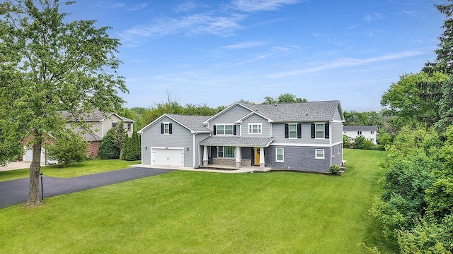 8081 Tennessee Ave, Willowbrook, IL 60527 - traditional-style home with asphalt driveway, a front yard, a garage, and a porch
