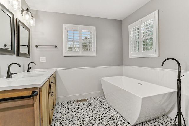 8081 Tennessee Ave, Willowbrook, IL 60527 - full bath with vanity, a soaking tub, and wainscoting
