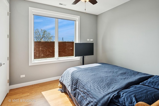 2442 N Clybourn Ave Unit 5S, Chicago, IL 60614 - bedroom with wood finished floors and ceiling fan