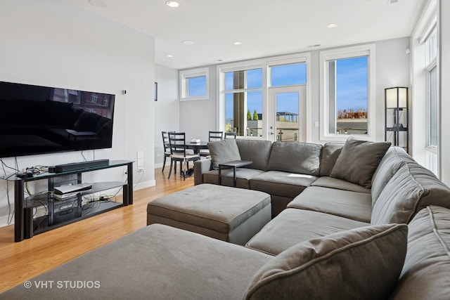2442 N Clybourn Ave Unit 5S, Chicago, IL 60614 - living area featuring wood finished floors, healthy amount of natural light, and recessed lighting