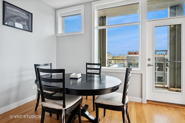 2442 N Clybourn Ave Unit 5S, Chicago, IL 60614 - dining area with healthy amount of natural light and wood finished floors