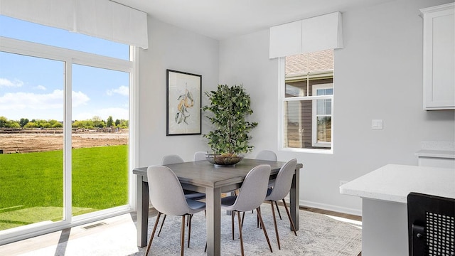 1818 Legacy Pointe Blvd, Plainfield, IL 60586 - dining area featuring light wood-type flooring and baseboards