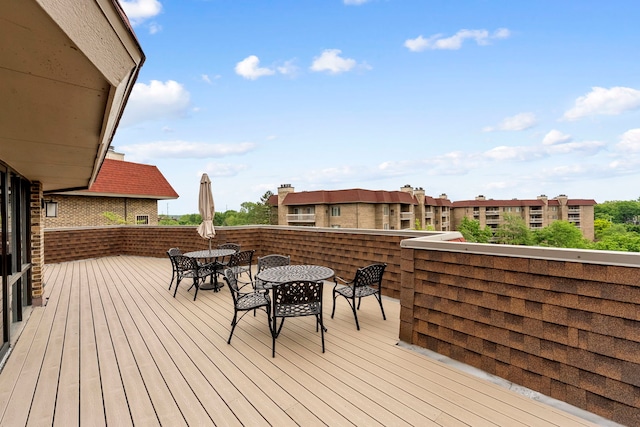 1250 Rudolph Rd Unit 4N, Northbrook, IL 60062 - wooden deck featuring outdoor dining area