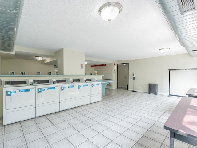 2754 N Hampden Ct Unit 1003, Chicago, IL 60614 - shared laundry with washing machine and clothes dryer and light tile patterned flooring