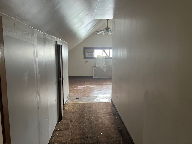 8144 S Ada St, Chicago, IL 60620 - hallway with radiator, vaulted ceiling, and carpet flooring