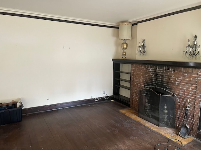 8144 S Ada St, Chicago, IL 60620 - unfurnished living room featuring wood-type flooring, ornamental molding, and a fireplace with flush hearth