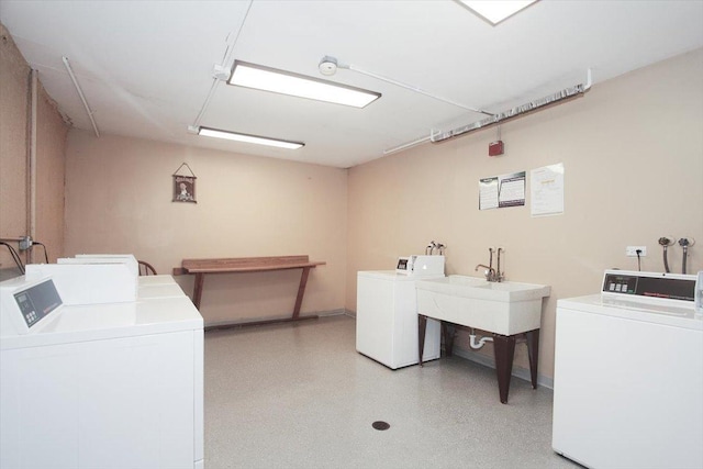 974 Thornton Ln Unit 107, Buffalo Grove, IL 60089 - shared laundry room featuring washer and dryer and baseboards