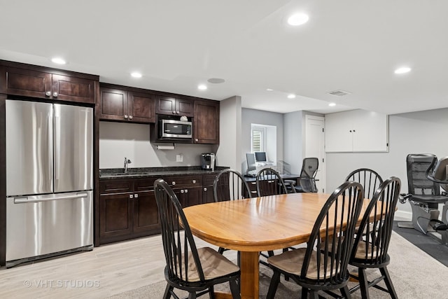 33 Citation Cir, Wheaton, IL 60189 - dining space with recessed lighting, light wood finished floors, and bar with sink