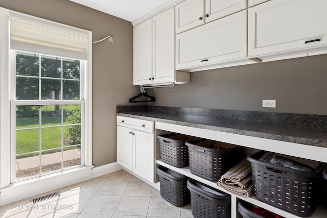 33 Citation Cir, Wheaton, IL 60189 - kitchen with dark countertops, healthy amount of natural light, and white cabinets
